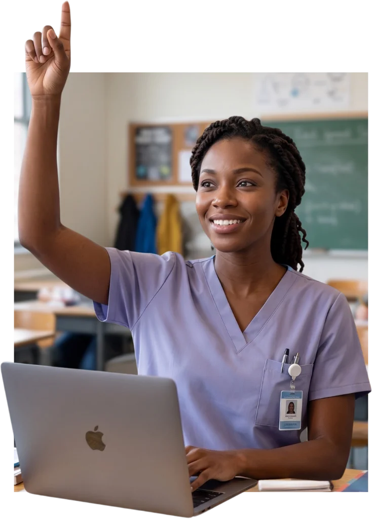 Two nurses reviewing study material on a laptop